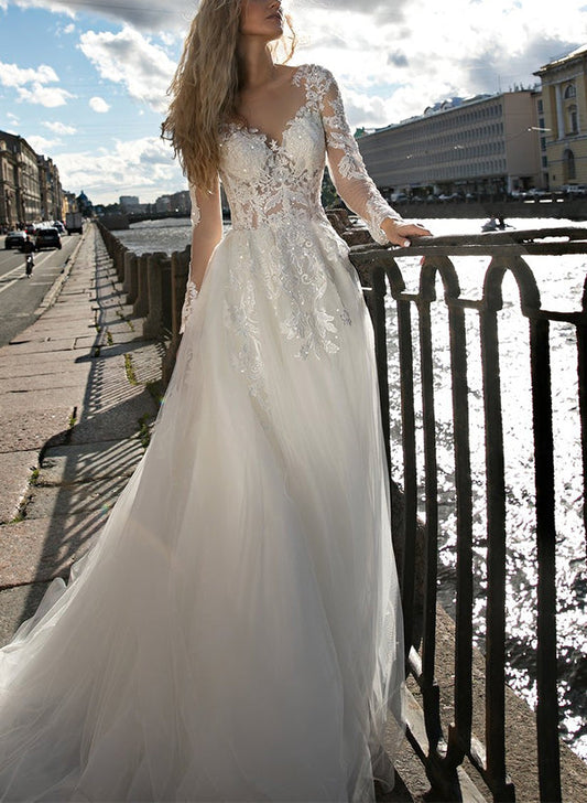 Illusion Neck A-Line Wedding Dress with Long Sleeves and Sweep Train crafted from Lace and Tulle