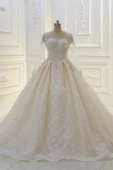 Bateau Long Sleeve Beaded Ball Gown Wedding Dress with Lace Appliques