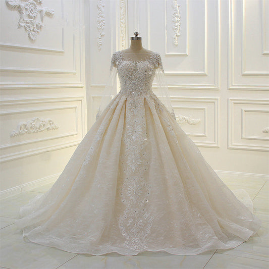 Bateau Long Sleeve Beaded Ball Gown Wedding Dress with Lace Appliques