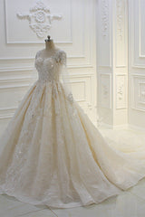 Bateau Long Sleeve Beaded Ball Gown Wedding Dress with Lace Appliques